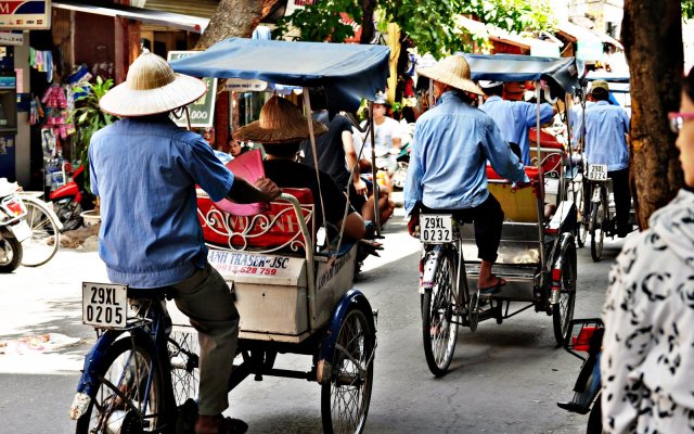 Stadtrundfahrt im Altstadtviertel Hanois mit einer Rikscha